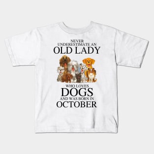 Never Underestimate An Old Lady Who Loves Dogs And Was Born In October Kids T-Shirt